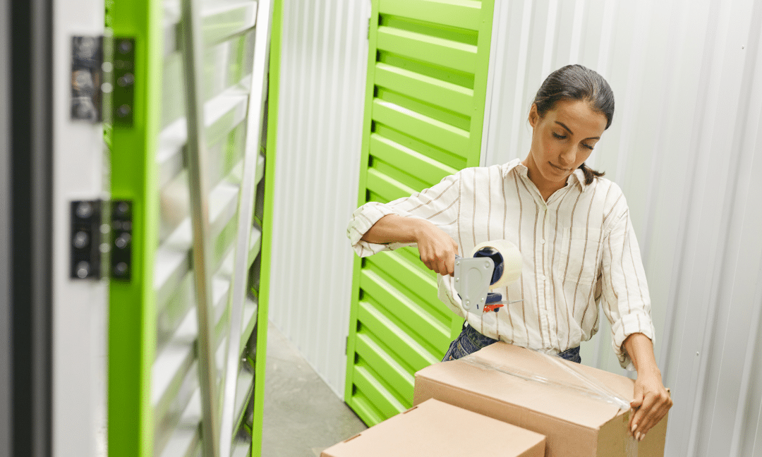 Image of a woman moving into her storage unit.